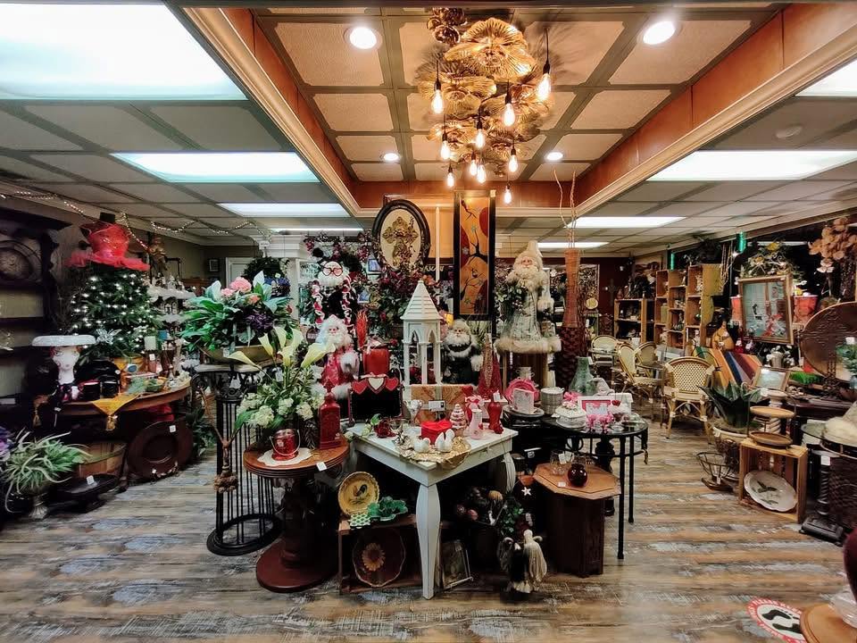 Inside Renew Consign & Pie Cafe with curated décor, florals, and furniture