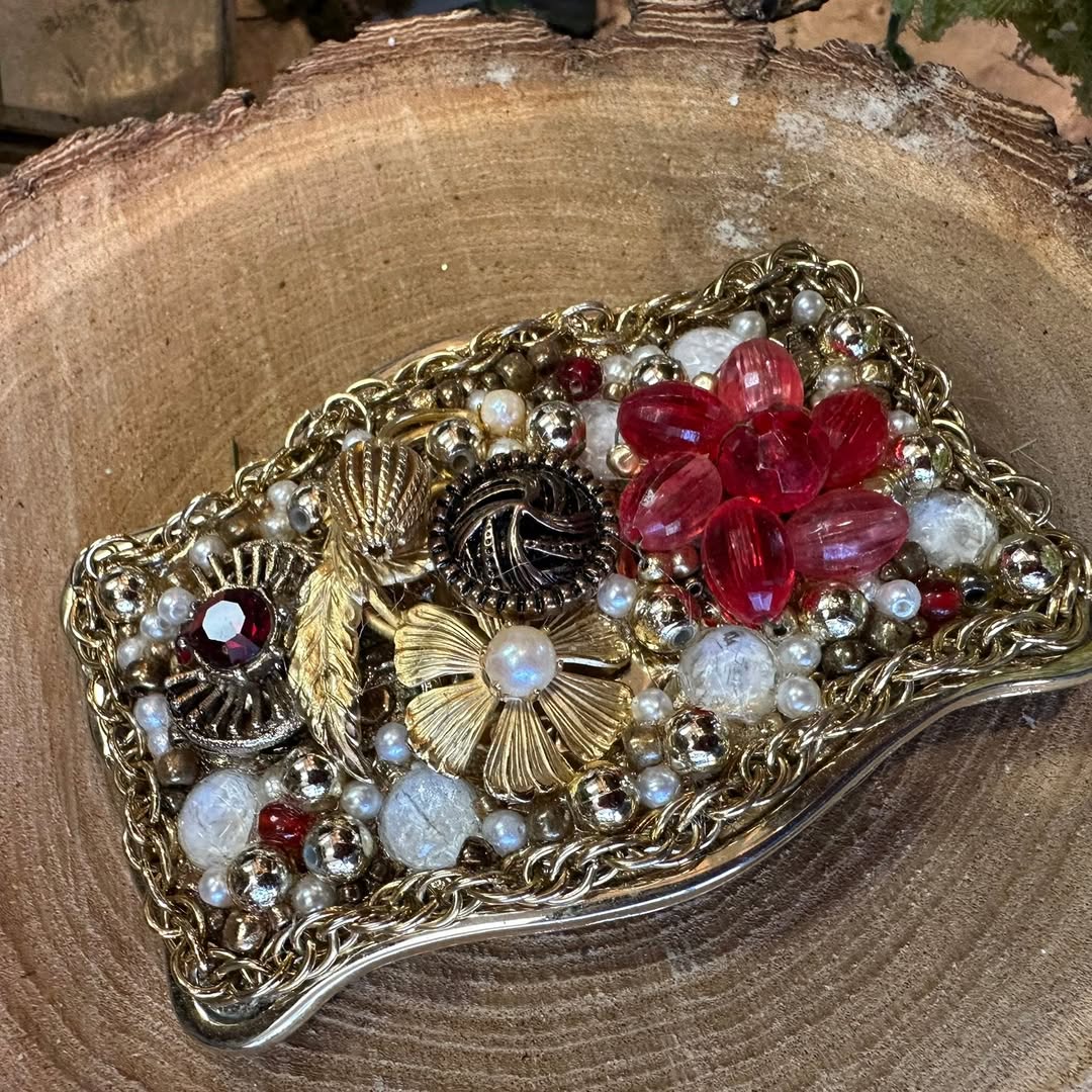 Jeweled trinket dish with a red flower centerpiece